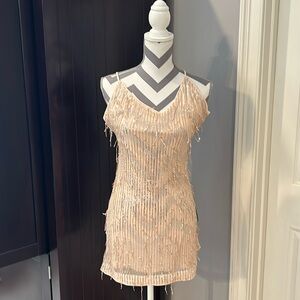 Peach colored LuLus sparkling dress. Size S. Knit material. Above the knee